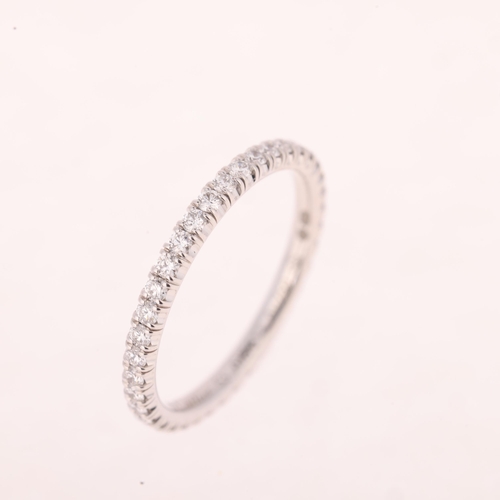 1124 - CARTIER - an 18ct white gold diamond Etincelle De Cartier full eternity wedding band ring, ref. CRB4... 