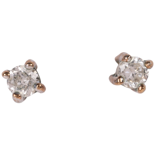 1133 - A pair of 9ct gold diamond stud earrings, each claw set with 0.1ct modern round brilliant-cut diamon... 