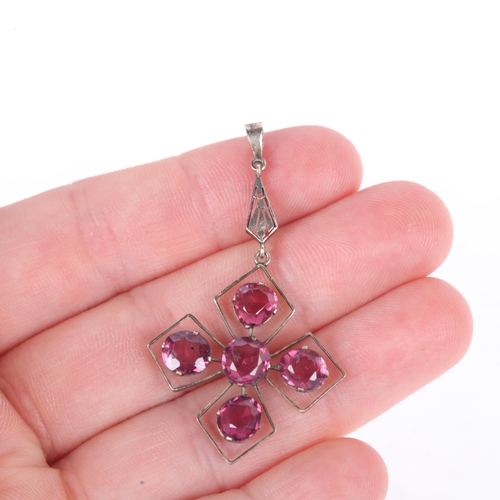 1135 - A Vintage pink tourmaline cruciform openwork drop pendant, set with round and oval mixed-cut pink to... 