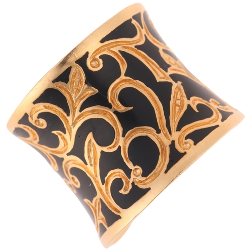 1136 - A Continental 18ct gold black enamel band ring, concave torque form with engraved scrollwork decorat... 