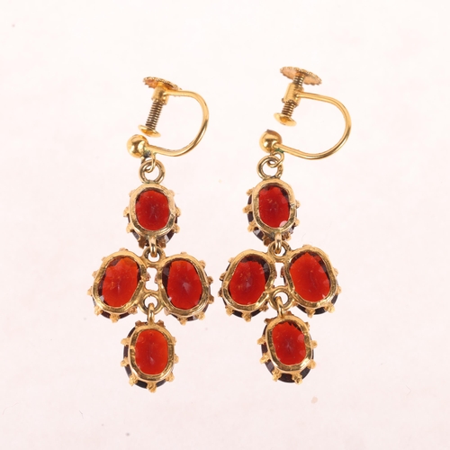 1143 - A pair of 9ct gold garnet drop earrings, set with oval mixed-cut garnets with screw-back fittings, 3... 