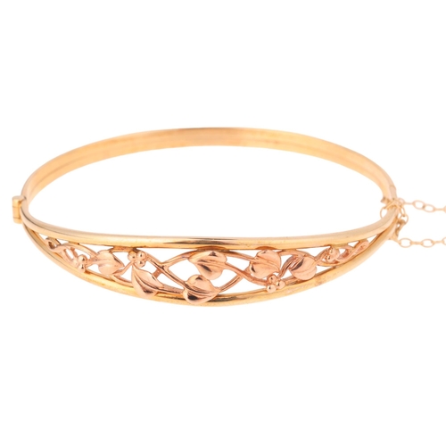 1150 - CLOGAU - a 9ct two-colour Welsh gold 'Tree Of Life' hinged bangle, setting height 11.5mm, internal c... 