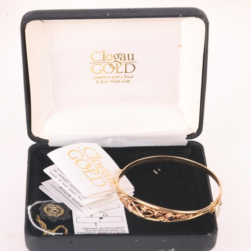 1150 - CLOGAU - a 9ct two-colour Welsh gold 'Tree Of Life' hinged bangle, setting height 11.5mm, internal c... 