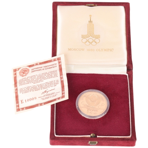 1153 - A 21.6ct (900 fine) gold USSR 'Lenin Stadium - Moscow 1980 Olympics' 100 roubles commemorative coin,... 