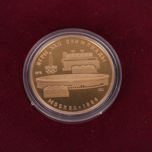 1153 - A 21.6ct (900 fine) gold USSR 'Lenin Stadium - Moscow 1980 Olympics' 100 roubles commemorative coin,... 