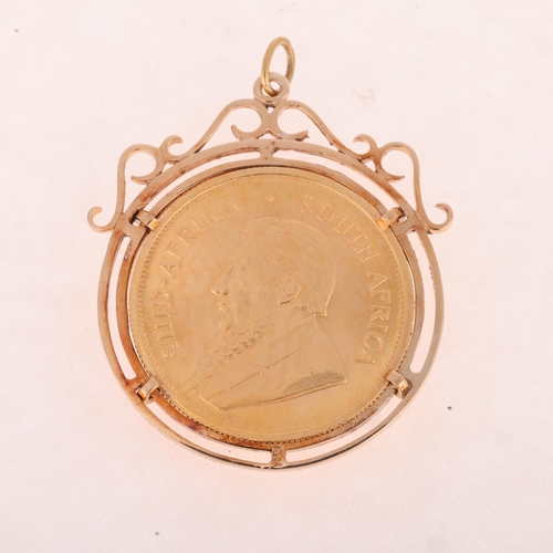 1156 - A 1970 South African one ounce fine gold Krugerrand coin, in 9ct gold pendant mount, 47.8mm, 41.4g