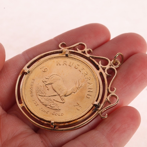 1156 - A 1970 South African one ounce fine gold Krugerrand coin, in 9ct gold pendant mount, 47.8mm, 41.4g