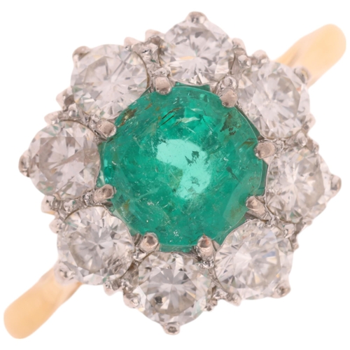 1167 - An 18ct gold emerald and diamond flowerhead cluster ring, set with round-cut emerald and modern roun... 