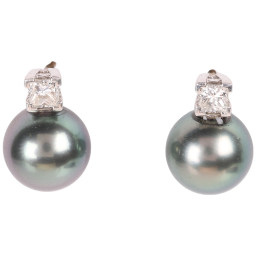 1171 - A Pair of Black Cultured Pearl and Diamond Stud Earrings,

each comprising a Princess-cut diamond su... 