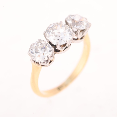 1173 - An 18ct gold three stone diamond ring, set with 3 old-cut diamonds totally approximately 2.4ct (0.9 ... 