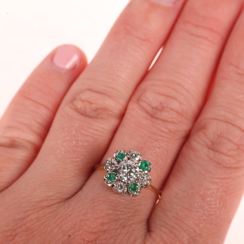 1203 - An 18ct gold emerald and diamond flowerhead cluster ring, set with round-cut emeralds and modern rou... 