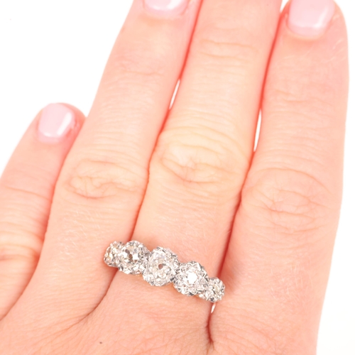 1206 - An Antique 18ct gold five stone diamond ring, platinum-topped, illusion set with old-cut diamonds, t... 