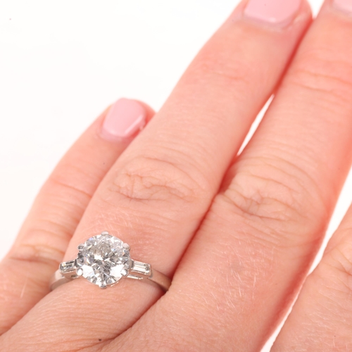 1212 - A platinum 1.6ct single stone diamond ring, claw set with 1.6ct modern round brilliant-cut diamond, ... 