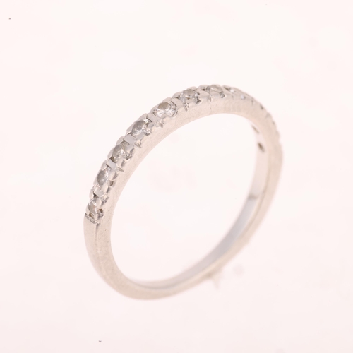 1213 - A platinum diamond half eternity band ring, set with modern round brilliant-cut diamonds, total diam... 