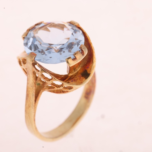 1219 - A 14ct gold blue synthetic spinel dress ring, circa 1970s, set with round-cut synthetic spinel, sett... 