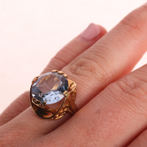 1219 - A 14ct gold blue synthetic spinel dress ring, circa 1970s, set with round-cut synthetic spinel, sett... 