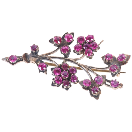 1220 - A silver-gilt ruby floral spray brooch, unmarked mount tests as silver, 50.7mm, 6.8g