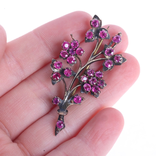 1220 - A silver-gilt ruby floral spray brooch, unmarked mount tests as silver, 50.7mm, 6.8g