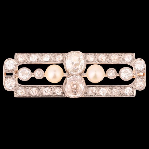 1104 - A Belle Epoque Edwardian natural pearl and diamond brooch, set with 5.5mm and 5.3mm button pearls se... 