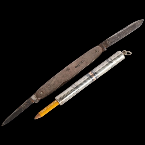 1549 - An Antique French silver niello and gold propelling pencil, 8cm, and a silver penknife (2)