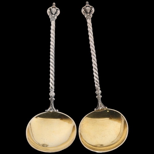 1572 - A pair of Antique German silver spoons, by Scheel, gilded bowls with twisted stems and figural termi... 