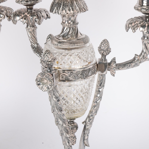 1598 - A pair of 19th Century French silver plated crystal glass candelabra, urn form, each with twin-branc... 