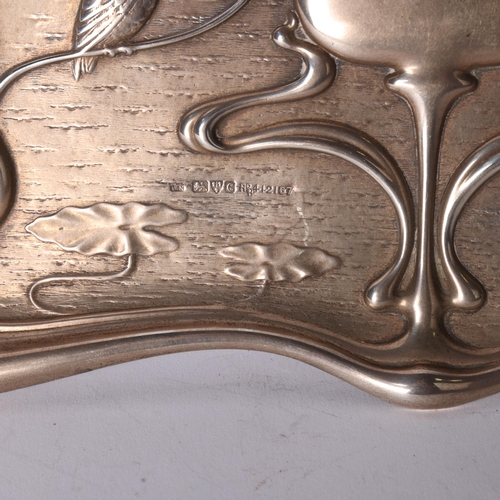 1604 - An Art Nouveau Edwardian silver 'Kingfisher' dressing table tray, William Neale & Son, Chester 1903,... 