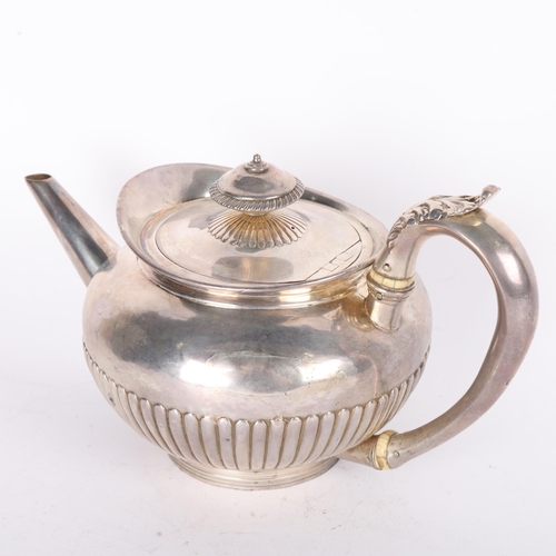 1607 - A George III silver teapot, Robert Hennell I & Samuel Hennell, London 1803, circular bulbous form wi... 