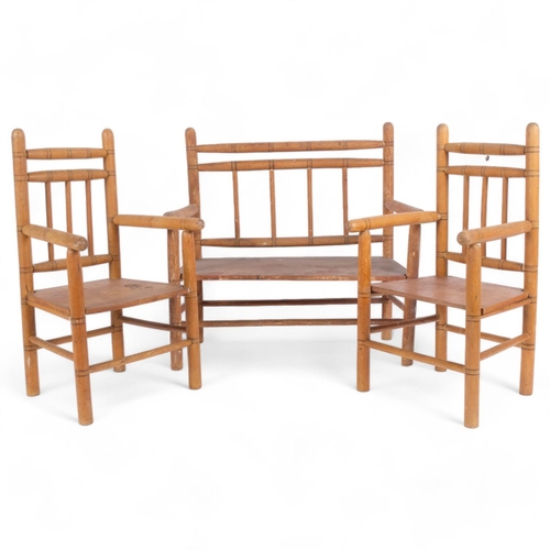 10 - An Antique pine faux bamboo 3-piece doll's furniture set, comprising 2-seater bench, and 2 armchairs... 