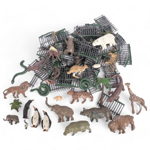 100 - A group of Britains painted lead zoo animals, and fencing