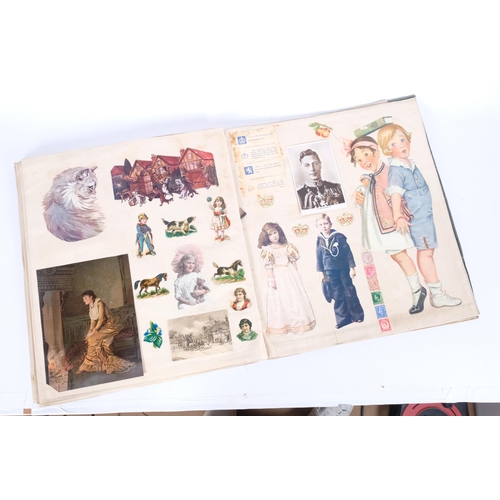 104 - A large Victorian scrap album, with cloth pages, 43cm x 40cm