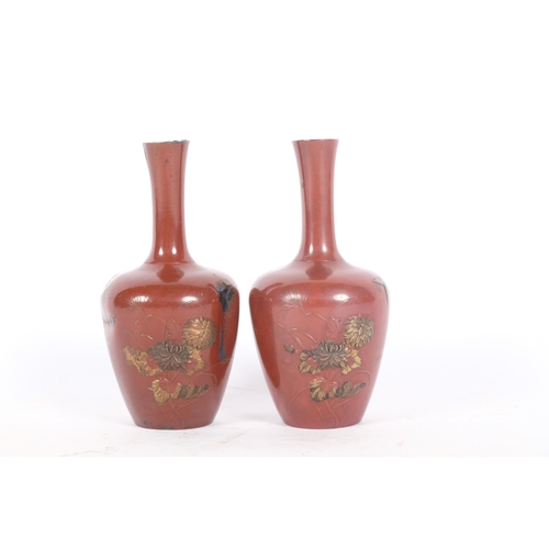 120 - A pair of small Japanese Meiji Period vases, with gilded animals and grapevine decoration, 10cm