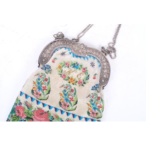 130 - A large 19th century Dutch lady's beaded purse/bag, with white metal frame, 26cm