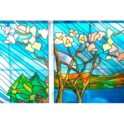 15 - 2 modern leadlight stained glass window panels, depicting countryside landscapes, each 87cm x 52cm