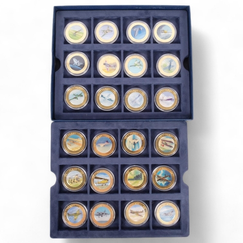 153 - A cased set of 24 'One Hundred Years of Flight 1903 - 2003' medallions