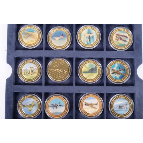 153 - A cased set of 24 'One Hundred Years of Flight 1903 - 2003' medallions