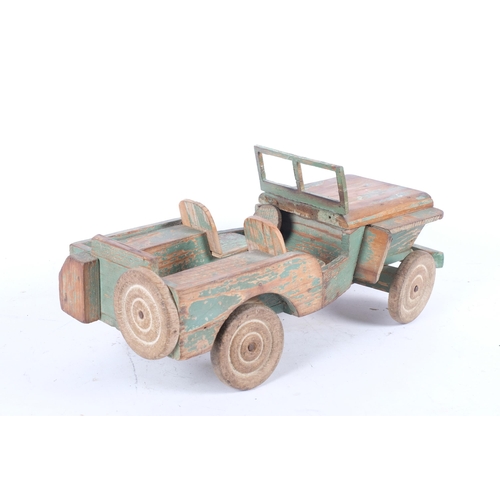 193 - A scratch-built painted pine 'Willys Jeep' toy, 36cm