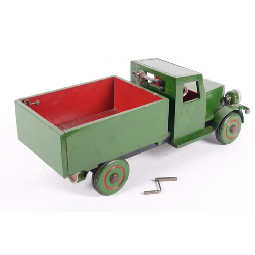 194 - A scratch-built painted pine tipper truck toy, 47cm