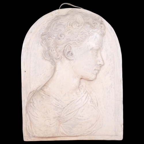 20 - A painted relief plaster figural plaque, depicting the boy St John The Baptist, after works by Donat... 