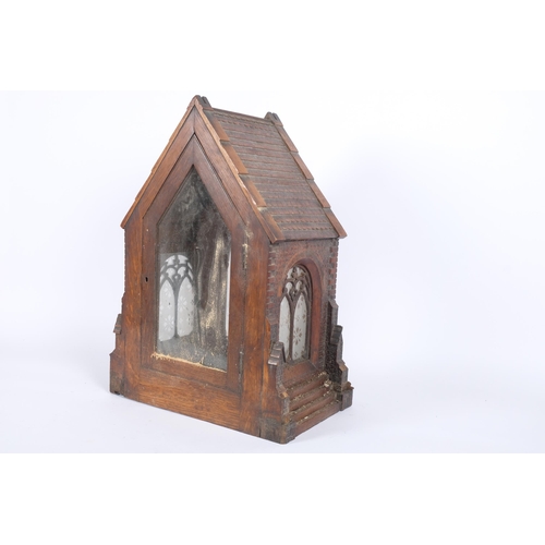 28 - A Victorian Gothic Revival oak 'Church' bracket clock case, with frosted glass side panels and archi... 