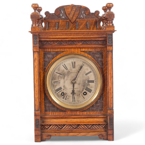 29 - A late 19th century oak 8-day mantel clock, by Winterhalder & Hofmeier, retailed by Morath of Liverp... 