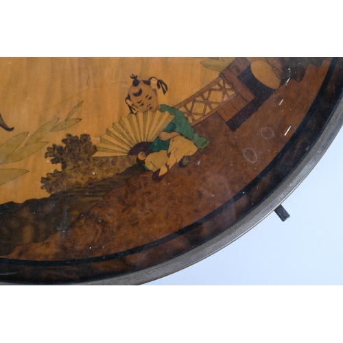 33 - A large Art Deco Japonisme lazy Susan, the single wood panel decorated with Japanese figures and lan... 