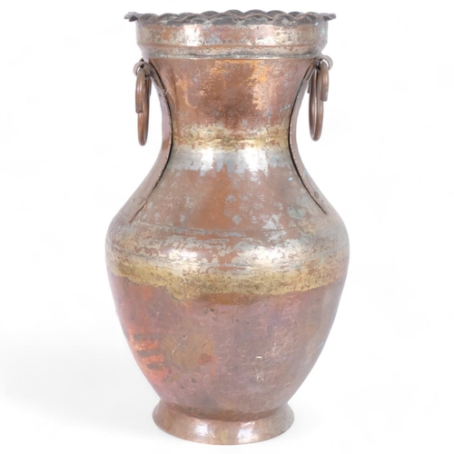 41 - A large Middle Eastern Islamic copper water jug, 49cm