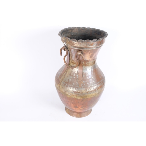 41 - A large Middle Eastern Islamic copper water jug, 49cm