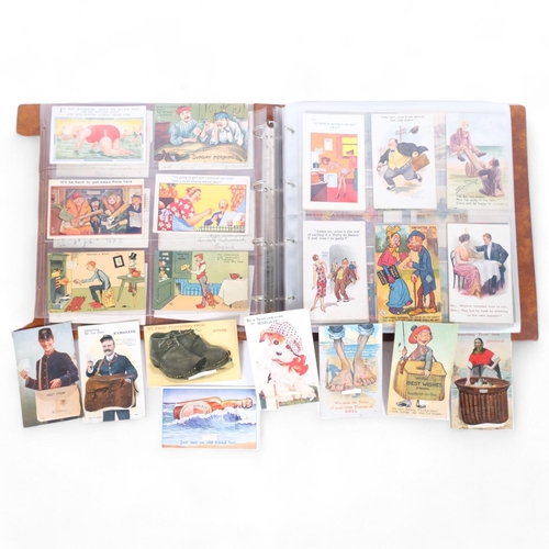 48 - An album of early and mid-20th century Mailing Novelty postcards, including comical and pull-out exa... 