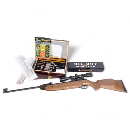 53 - An SMK20 .22 calibre break-barrel air rifle, with SMK 6x40 mil-dot scope, and 2 boxed sets of gun cl... 