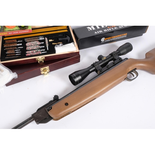 53 - An SMK20 .22 calibre break-barrel air rifle, with SMK 6x40 mil-dot scope, and 2 boxed sets of gun cl... 