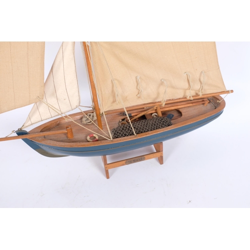 54 - A Vintage wooden hulled 'The Prawner' model boat on stand, hull 45cm, H54cm