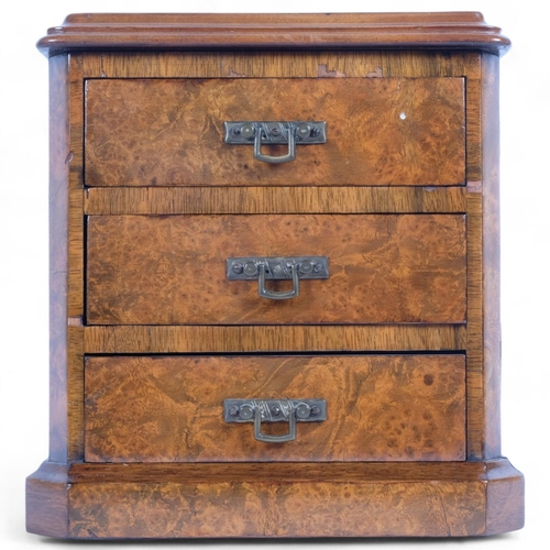 7 - A 19th century figured burr-walnut apprentice-piece table-top chest of drawers, 3 drawers with brass... 