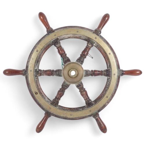 74 - An Antique teak and brass-bound ship's wheel, diameter 64cm